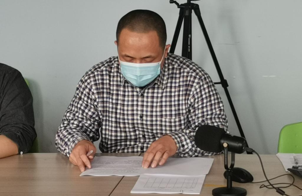 11997